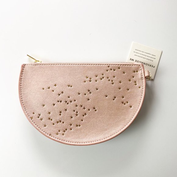 Anthropologie Handbags - Anthropologie NWT Halfmoon Star Embossed Clutch